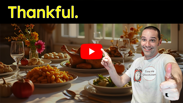 Thankful; Host of Time We Discuss is pointing to a the play button and in the background is a dining room table with a full Thanksgiving dinner.