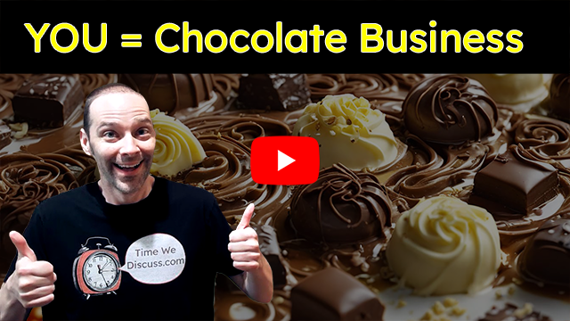 You = Chocolate Business; Host of Time We Discuss is giving two thumbs up. Background os a tray of white and milk chocolate.